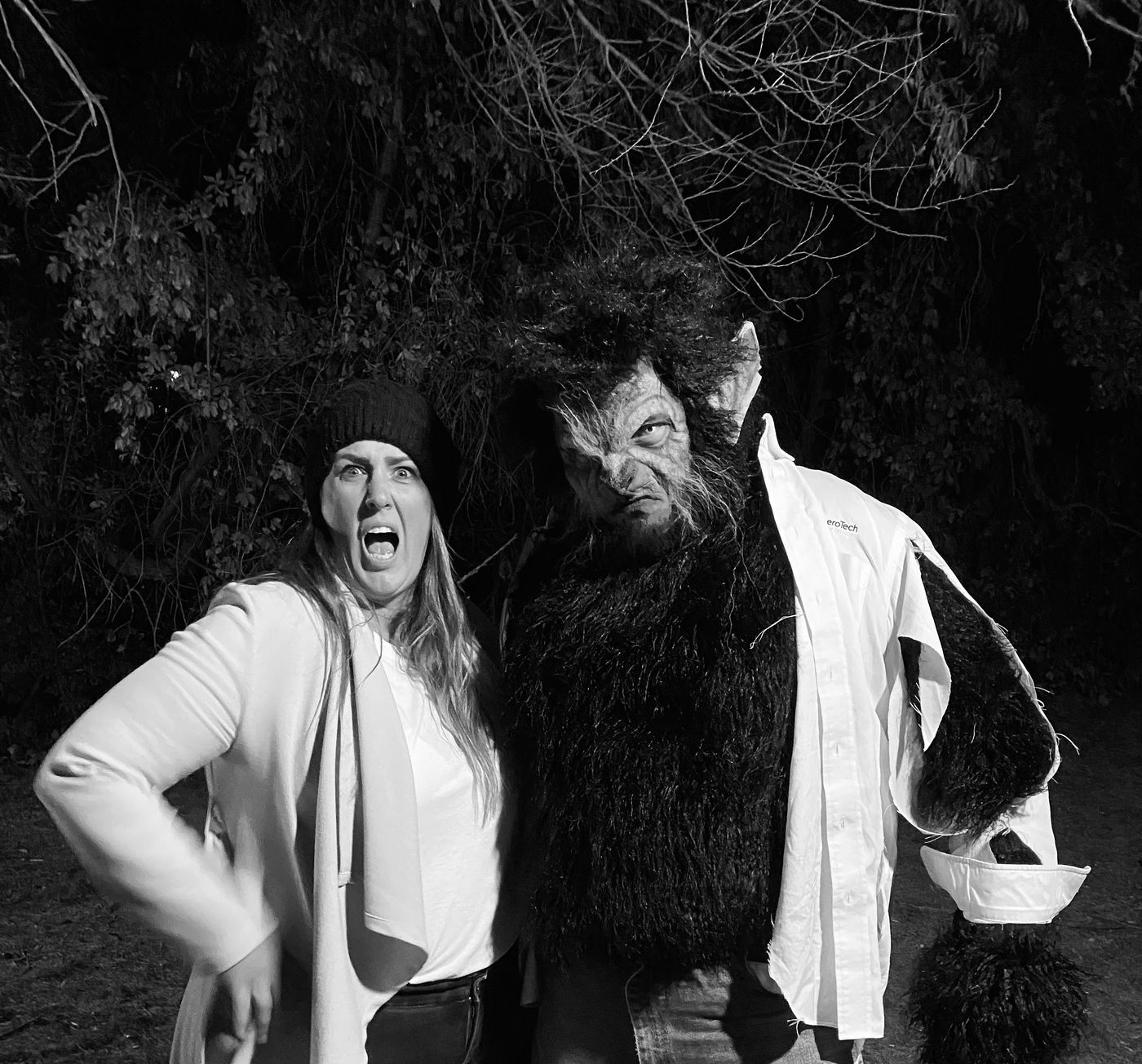 Producer Brandie Lee McDonald with BJ Whimpey in werewolf costume, black and white photo