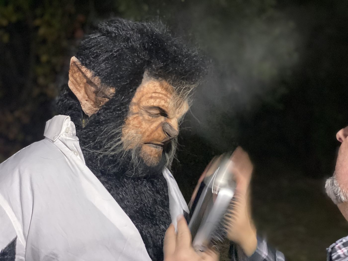 Shawn Gordon touching up BJ Whimpey's werewolf makeup