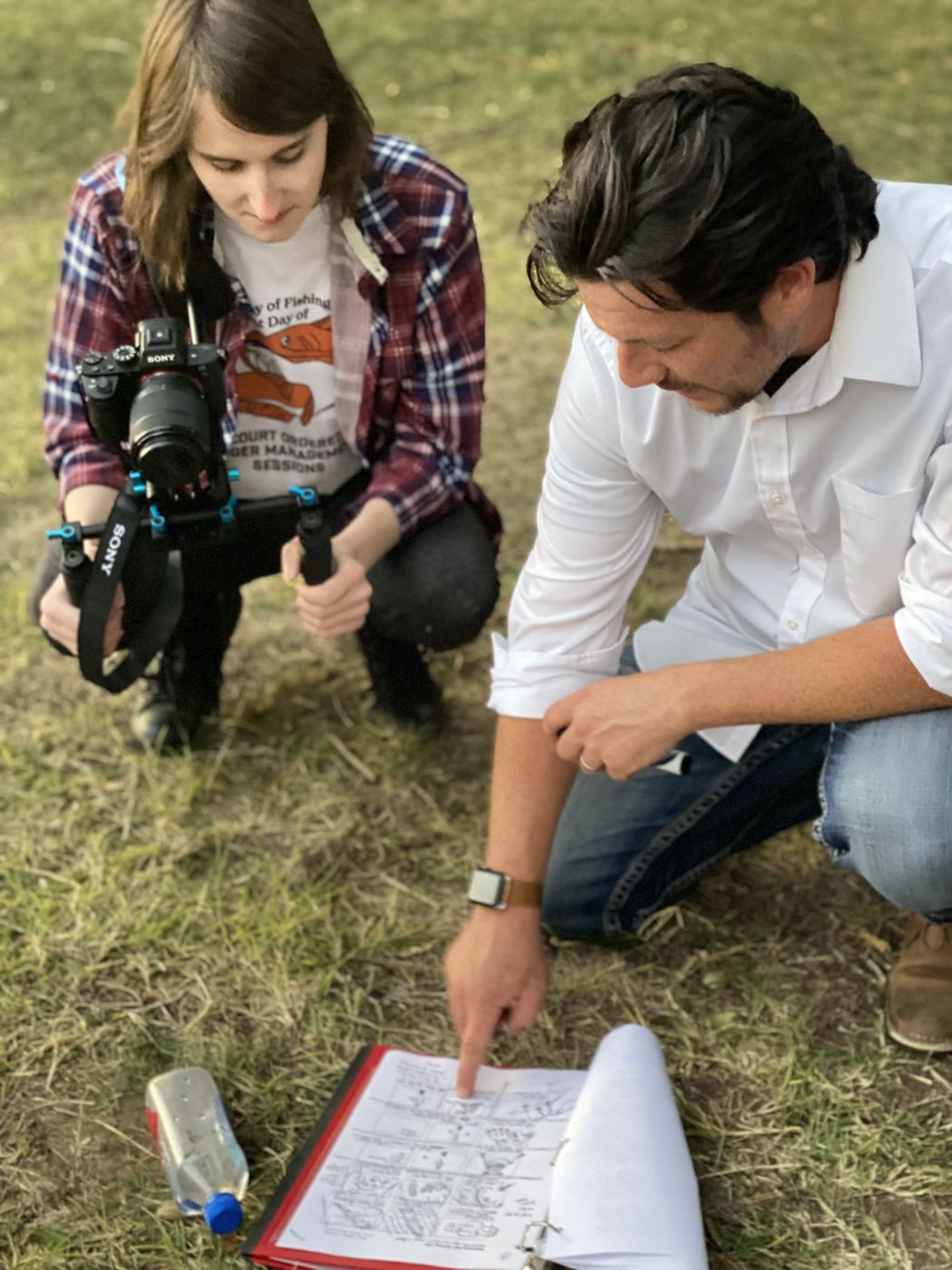 Writer/director Ryan McDonald reviewing storyboards on location with the camera operator
