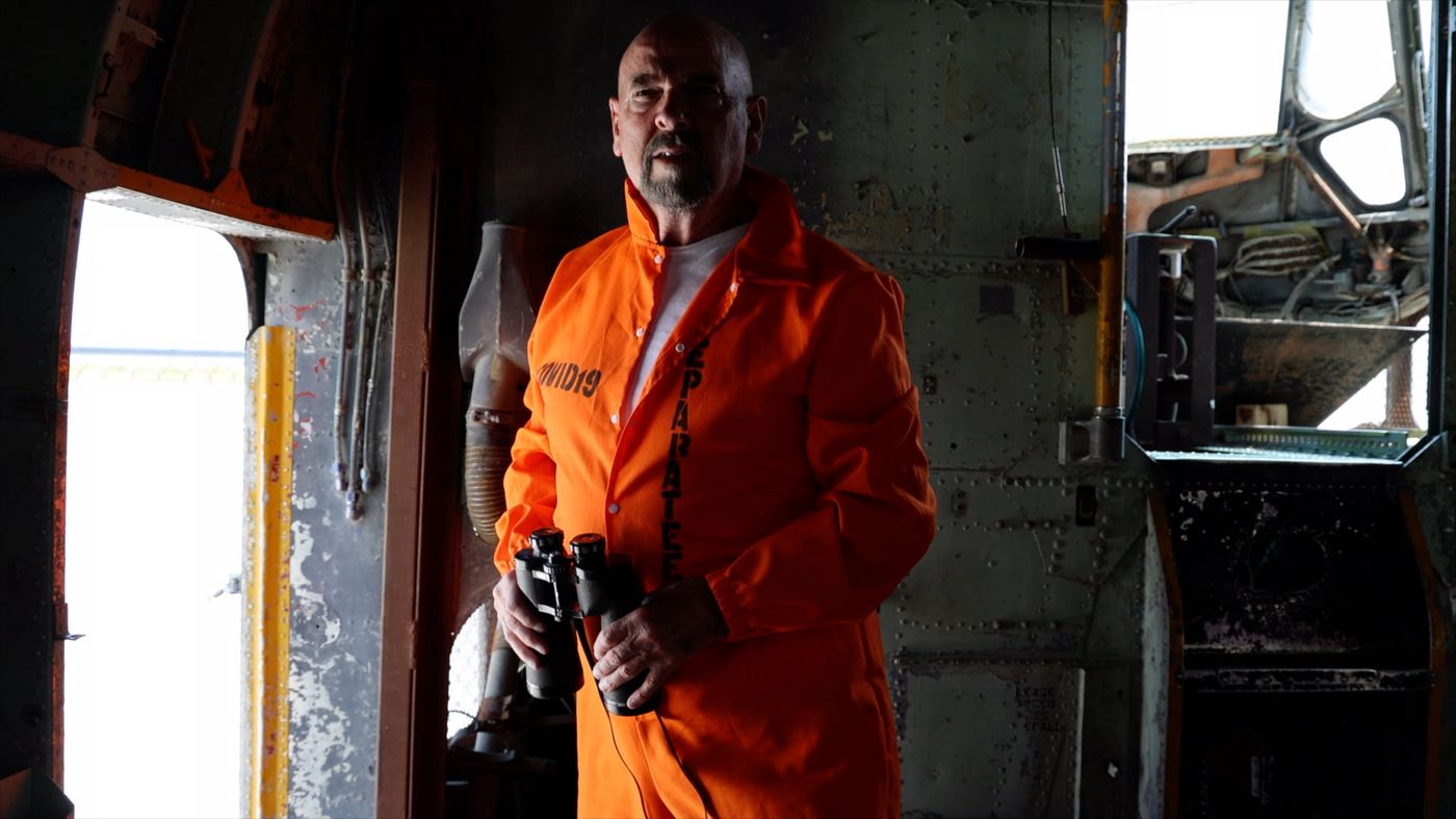 Michael Rathburn in character on set