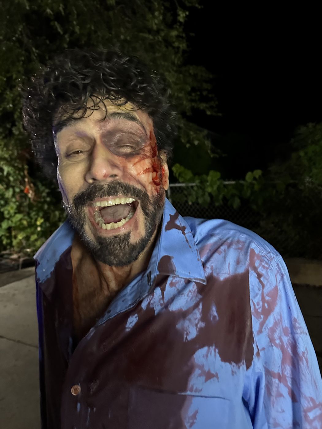 Actor Dennis Record in bloody creature makeup