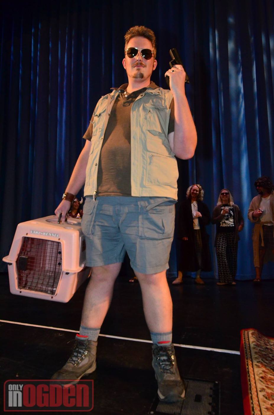 A Walter Sobchak costume holding a pet carrier at the 2014 festival