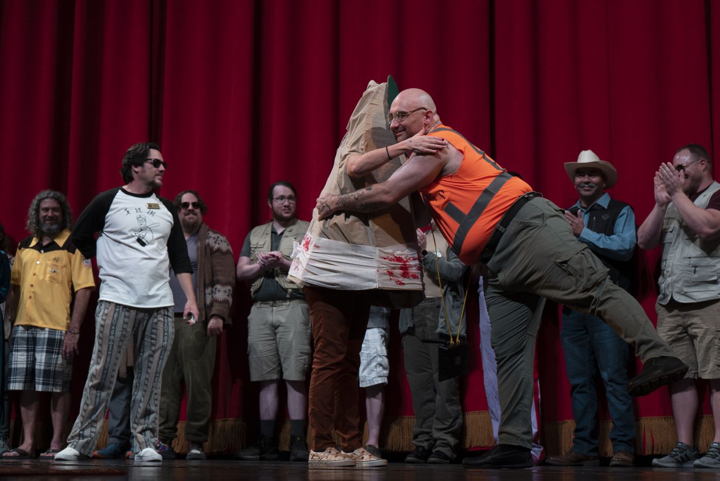A Jesus Quintana costume bowling on stage