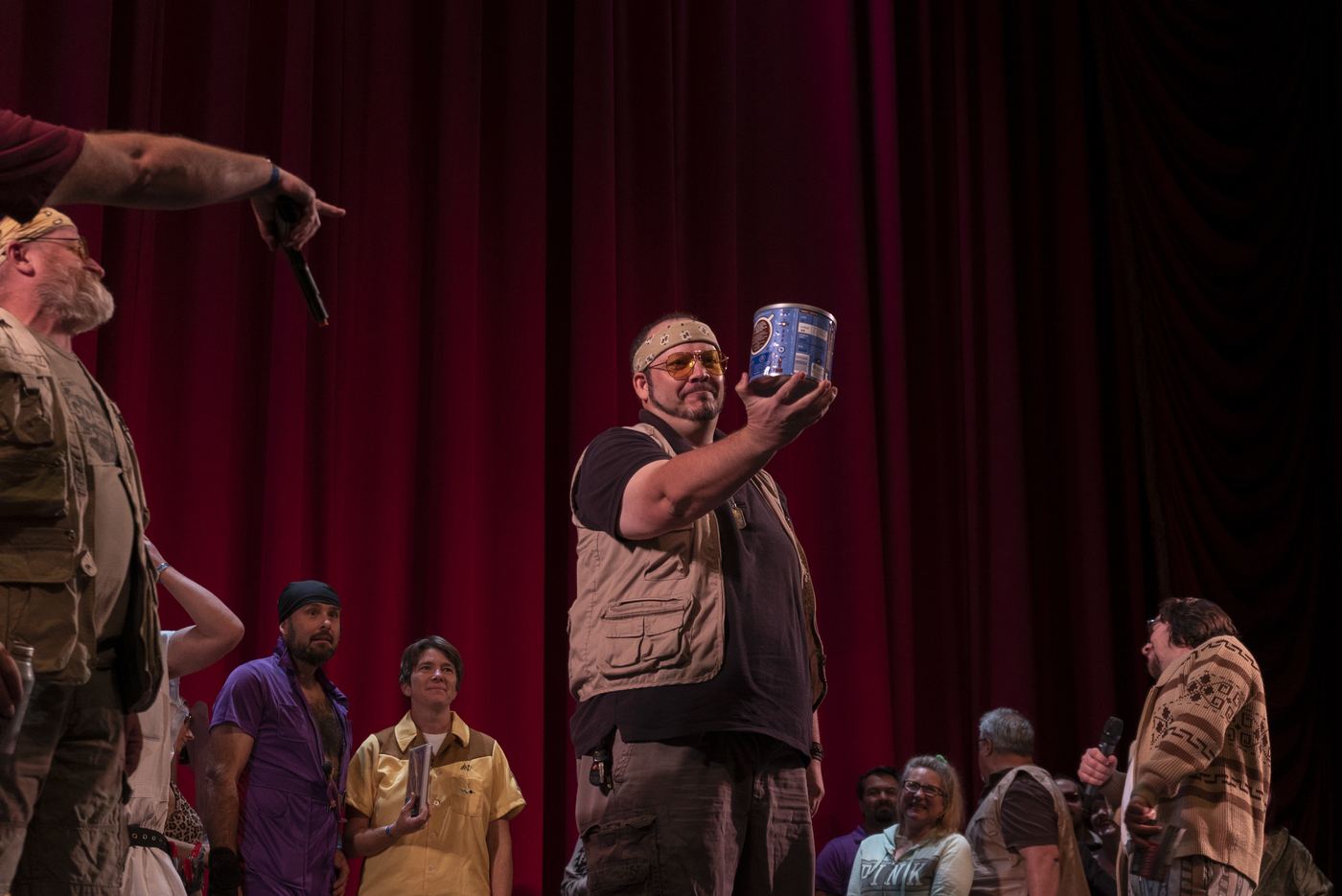Costume contest winner holding a can of coffee