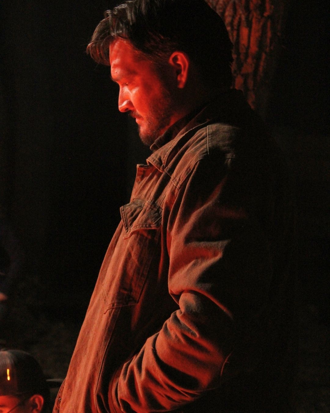 BJ Whimpey in character, lit in red